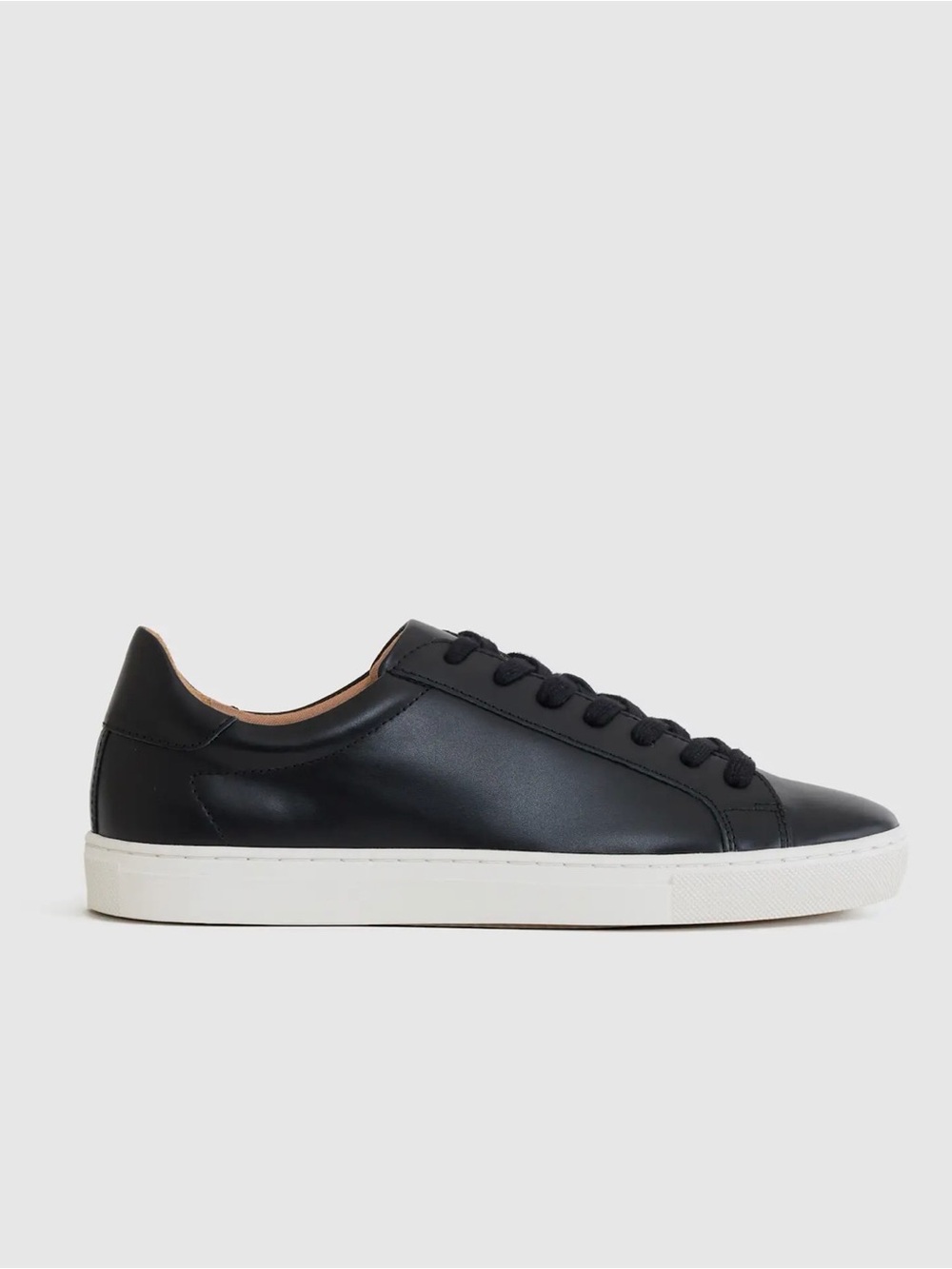 Classic Black Leather Low-Top Sneaker with White Cup Sole